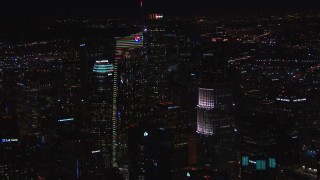 CAP_018_201 - HD stock footage aerial video of orbiting Wilshire Grand Center at night, Downtown Los Angeles, California
