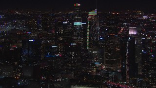 CAP_018_218 - HD stock footage aerial video flying by Wilshire Grand Center and skyline at night, Downtown Los Angeles, California