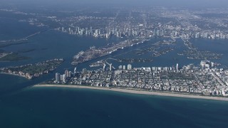 CAP_020_010 - HD stock footage aerial video of approaching South Beach near the port and Downtown Miami, Florida
