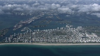 CAP_020_011 - HD stock footage aerial video of slowly passing South Beach, seen from high altitude, Miami, Florida