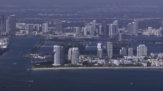 CAP_020_022 - HD stock footage aerial video of flying by South Beach high-rises on the coast, Florida
