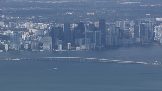 CAP_020_042 - HD stock footage aerial video of the city's skyline behind the Rickenbacker Causeway, Miami, Florida