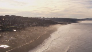 CAP_021_007 - HD stock footage aerial video of flying away from hillside homes with ocean views, Del Mar, California