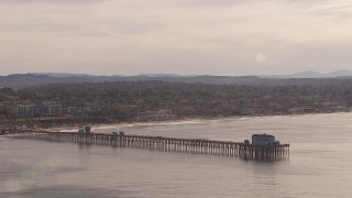 CAP_021_025 - HD stock footage aerial video of flying away from Oceanside Pier with view of the community of Oceanside, California