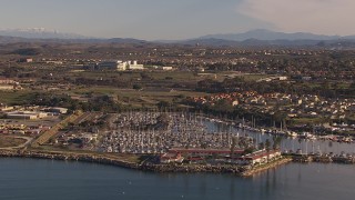 CAP_021_026 - HD stock footage aerial video of a marina and oceanfront hotel in Oceanside, California