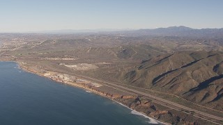 CAP_021_046 - HD stock footage aerial video of approaching the San Onofre Nuclear Power Plant, California