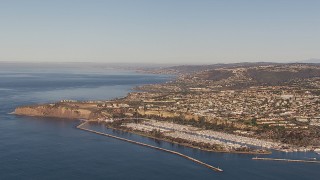 CAP_021_060 - HD stock footage aerial video of flying toward the harbor and coastal neighborhoods in Dana Point, California