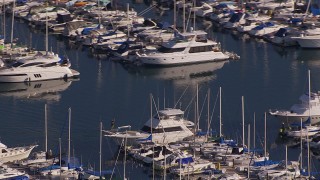 CAP_021_062 - HD stock footage aerial video of orbiting yachts and sailboats at the harbor in Dana Point, California