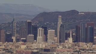 CAP_021_086 - HD stock footage aerial video of the city's skyline and Hollywood Sign, Downtown Los Angeles, California
