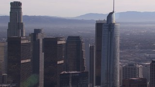 CAP_021_102 - HD stock footage aerial video flyby Wilshire Grand Center and US Bank Tower skyscrapers, Downtown Los Angeles, California
