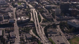 CAP_021_106 - HD stock footage aerial video of the 101 / 110 interchange with heavy traffic, Downtown Los Angeles, California
