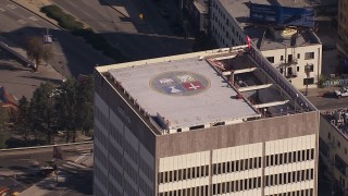 CAP_021_113 - HD stock footage aerial video of orbiting the roof of an office building in Echo Park, Los Angeles, California