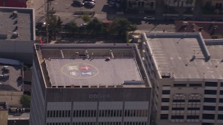 CAP_021_114 - HD stock footage aerial video of flying away from the roof of an office building in Echo Park, Los Angeles, California
