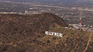 CAP_021_118 - HD stock footage aerial video of orbiting the famous Hollywood Sign, Los Angeles, California