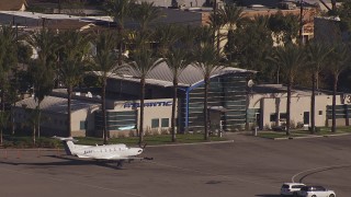 CAP_021_131 - HD stock footage aerial video of Atlantic Aviation at Burbank Airport, California