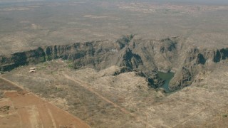 CAP_026_002 - HD stock footage aerial video of a deep canyon and river near Victoria Falls, Zimbabwe