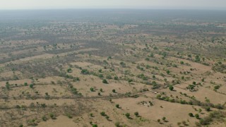 CAP_026_009 - HD stock footage aerial video of flying over open savanna, Zimbabwe