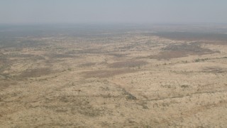 CAP_026_020 - HD stock footage aerial video of flying past open savanna, Zimbabwe