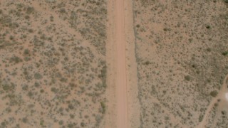 CAP_026_117 - HD stock footage aerial video of a bird's eye view of a dirt road, Zimbabwe