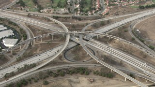 CBAX01_030 - HD stock footage aerial video of the Interstate 15 and Highway 91 interchange, Corona, California 