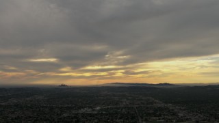 CBAX01_092 - HD aerial stock footage of downtown, Los Angeles Basin, Pasadena, Central Los Angeles, California, sunset