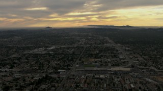 CBAX01_093 - HD aerial stock footage of downtown, Los Angeles Basin, Pasadena, Central Los Angeles, California, sunset
