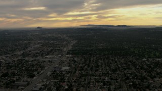 CBAX01_094 - HD aerial stock footage of downtown, Los Angeles Basin, Pasadena, Central Los Angeles, California, sunset
