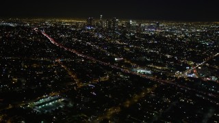 DCA01_008 - 5K aerial stock footage tilt up revealing downtown Los Angeles skyline, California