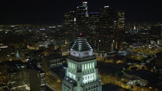 DCA01_028 - 5K stock footage aerial video flying over Highway 110, revealing Los Angeles City Hall and skyline, California