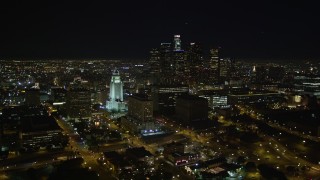 DCA01_029 - 5K aerial stock footage Downtown Los Angeles skyline and City Hall at night, California