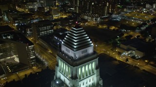 DCA01_030 - 5K aerial stock footage flying over Highway 110 and Los Angeles City Hall, revealing skyscrapers at night, California