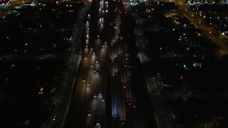 DCA01_063 - 5K stock footage aerial video bird's eye view of Highway 110 at night, Los Angeles, California