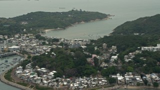 DCA02_007 - 4K aerial stock footage of ferries by Peng Chau Island, Outlying Islands, Hong Kong, China