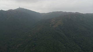 DCA02_024 - 4K aerial stock footage of green mountains in the New Territories, Hong Kong, China