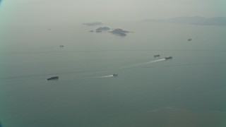 DCA02_050 - 4K aerial stock footage oil slick and barges near Sha Chau Island in the South China Sea, New Territories, Hong Kong, China