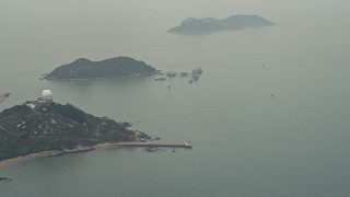 DCA02_052 - 4K aerial stock footage of Tin Hau Temple on Sha Chau Island in the South China Sea, New Territories, Hong Kong, China