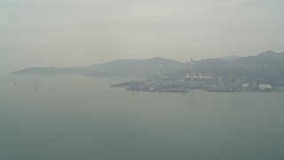 DCA02_053 - 4K aerial stock footage of Castle Peak Power Station seen from the South China Sea, New Territories, Hong Kong, China