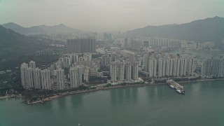 DCA02_058 - 4K aerial stock footage of waterfront apartments high-rises New Territories, Hong Kong, China
