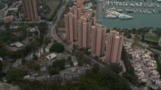 DCA02_062 - 4K aerial stock footage flyby Hong Kong Gold Coast waterfront apartment high-rises in New Territories, Hong Kong, China