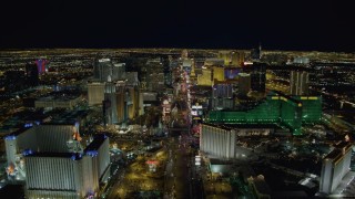 DCA03_015 - 4K stock footage aerial video of Las Vegas Boulevard past Excalibur, New York New York, MGM Grand, Las Vegas, Nevada Night