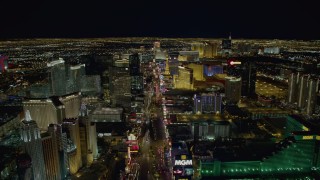 DCA03_016 - 4K aerial stock footage of Las Vegas Boulevard between New York New York and MGM Grand to Monte Carlo, Las Vegas, Nevada Night