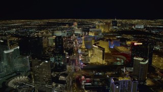 DCA03_017 - 4K aerial stock footage of Las Vegas Boulevard past Aria to Planet Hollywood, Las Vegas, Nevada Night