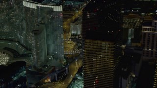 DCA03_046 - 4K aerial stock footage of the Cosmopolitan, Aria Resort and Casino, Las Vegas, Nevada Night