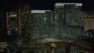 DCA03_049 - 4K aerial stock footage of approaching Aria Resort and Casino, Las Vegas, Nevada Night