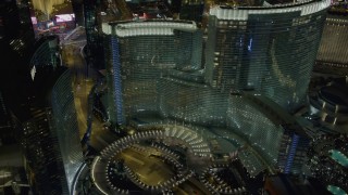 DCA03_050 - 4K aerial stock footage of ascending near Aria Resort and Casino, Las Vegas, Nevada Night
