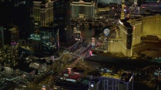 DCA03_059 - 4K aerial stock footage of Las Vegas Boulevard with hotels, Las Vegas, Nevada Night
