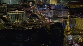DCA03_061 - 4K aerial stock footage of Las Vegas Boulevard with hotels, Las Vegas, Nevada Night
