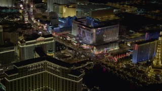 DCA03_062 - 4K aerial stock footage of Las Vegas Boulevard with hotels, Las Vegas, Nevada Night