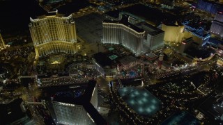 DCA03_068 - 4K aerial stock footage of flying by Palazzo, Venetian, Harrah's, Imperial Palace, Las Vegas, Nevada Night