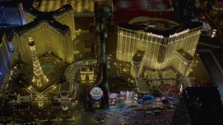 DCA03_070 - 4K stock footage aerial video of flying by Paris, Planet Hollywood, Polo Towers, Las Vegas, Nevada Night